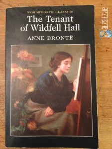 Cover von Anne Brontes The Tenant of Wildfell Hall in schwarz . Illustrierendes Gemälde zeigt eine malende Frau.